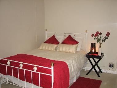 Spacious Master bedroom is carpeted with flat screen TV included