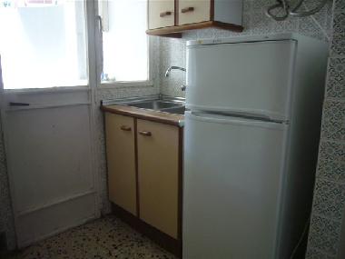 Kitchen with wide washer