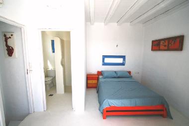 bedroom upstairs, with ensuite bathroom and balcony overlooking the sea, lahania and the valley
