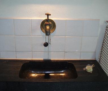 Sink of Belgian stone with old cold tab