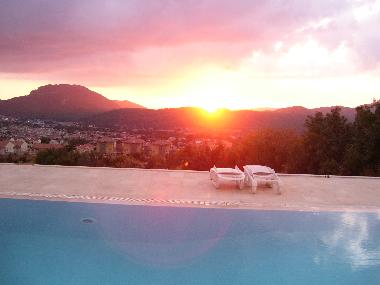 our pool with sunset backdrop