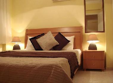 Double bedroom with A/C matching furniture, blackout blinds