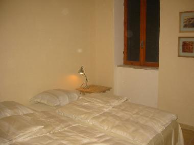 The bedroom with two single beds