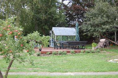 Greenhouse/terrace and the garden