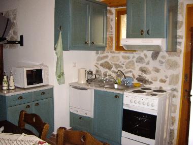 The fully equipped kitchen