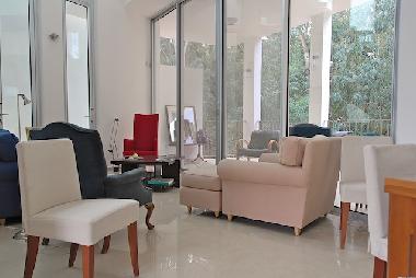 Seven meter atrium over the living room for spacious living...