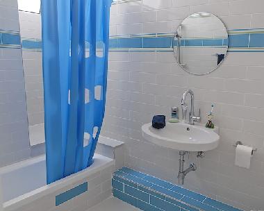 One of four impeccable bathrooms