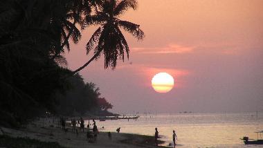 Sunset from beach in front of the villa