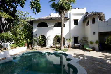 Pool and house