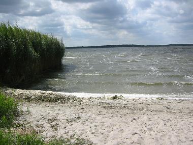 The riverside beach which is safe for bathing.