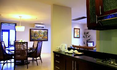 Open plan fully fitted kitchen and dining table