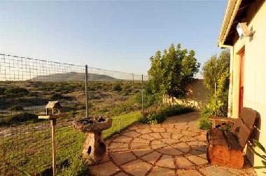 Tranquil garden bordering on Nature conservation area