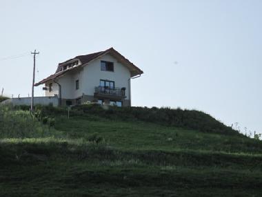 DISTANT VIEW OF THE HOUSE