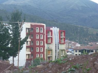 Its the building on the left, second balcony from the top