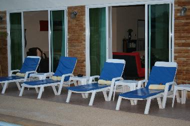 Living room opening onto pool side
