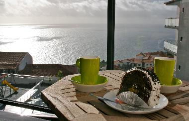 Enjoy and eat a nice cake on our balcony!