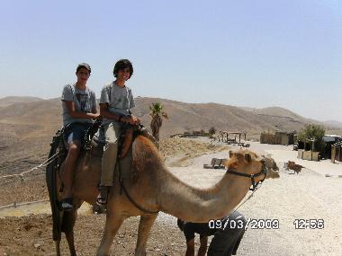 CAMEL RIDING ON "GENESIS LAND" NEARBY