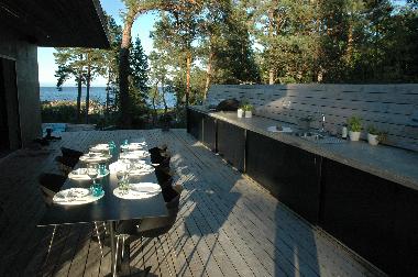 Terracce (30 m2) by the main house. Make your food looking out on the sea at the outdoor kitchen