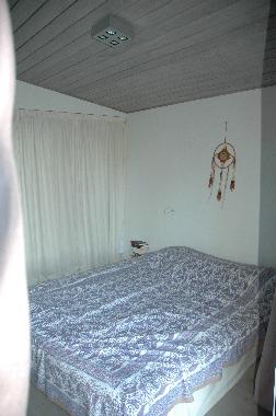 Master bedroom with a twin bed