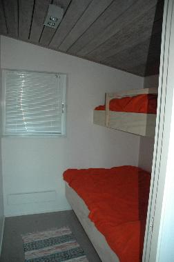 One of three similar bedrooms in the main house with one 120cm bed and one 90 cm bed