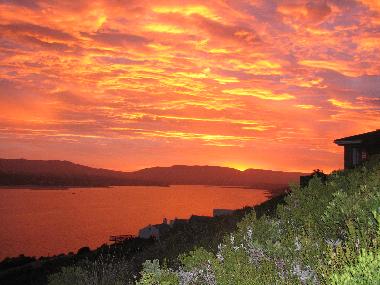 Stunning sunset from the "sundowners bench" in garden