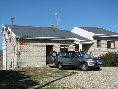 Back of the house - easy parking for cars and boat