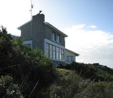Side view of the house from path coming up the hill