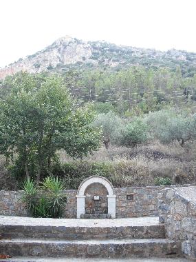 Mount Taygetos and a fountain