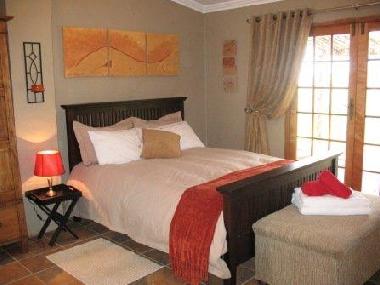 O/plan bedroom/bathroom for romantic evenings.Opens onto patio. 