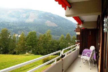 big  furnished balcony with perfect mountain view