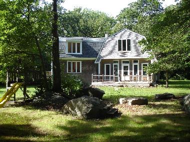 view through the garden onto the front porch