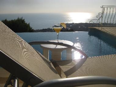 Cocktail with view at swimmingpool