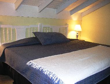 Bedroom with king size bed.