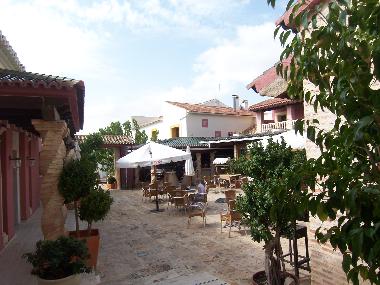 The bar and hotel in the plaza