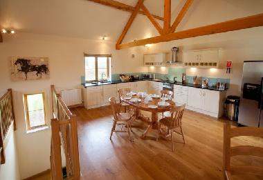 The fully equipped kitchen diner space.