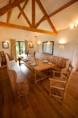 The dining space with church pew style seating