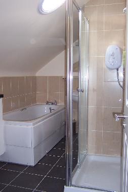 Upstairs bathroom with seperate shower. En suite to both upstairs bedrooms