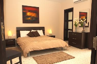 Air-conditioned Master bedroom with ensuite facilities