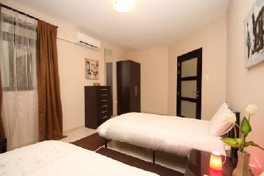 Air-conditioned twin bed room
