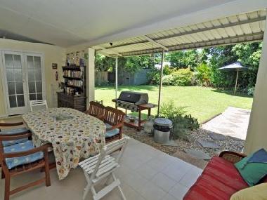 Dining and BBQ on back patio at Wilks House