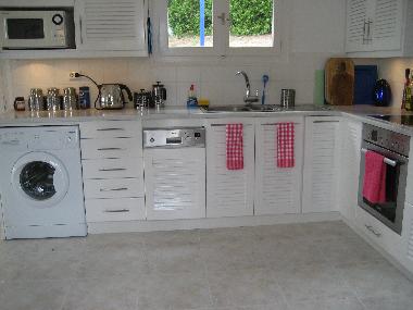 Custom-built Fitted Kitchen with Marble Work Tops