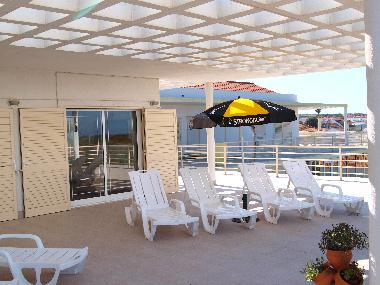 Entrance to the terrace from kitchen, lounge and dining area