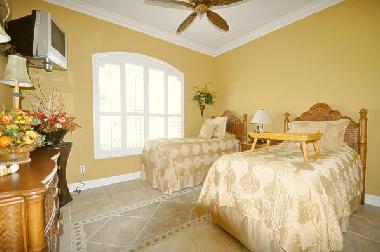 guest bedroom with twin beds
