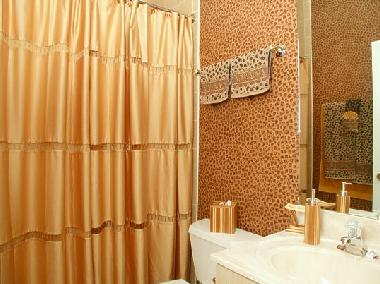 guest bathroom next to queen-size bedroom