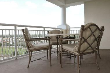 balcony with dining furniture