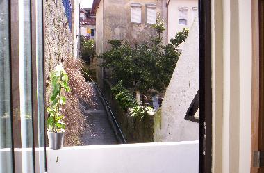 small balcony leading to garden