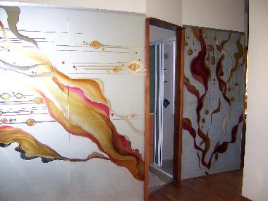 bedroom wall with entrance to the ensuite bathroom