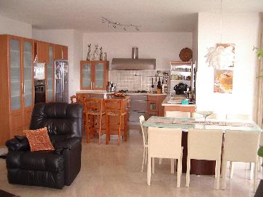 Open plan kitchen, dining area, living room