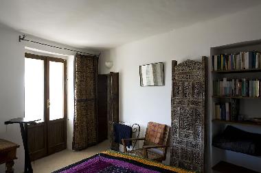 Bedroom overlooking the balcony