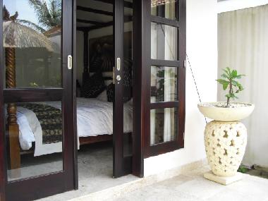 Bedroom overlooking the Pool